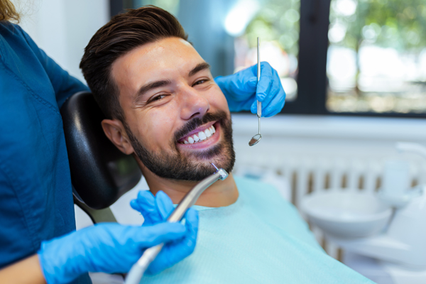 How A Restorative Dentist Helps Rebuild Your Smile